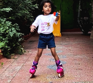 YOUNGEST KID TO SOLVE FIVE RUBIK CUBES IN FASTEST TIME WHILE SKATING