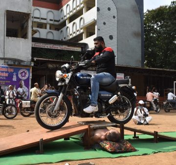 MOST NUMBER OF BULLET BIKES PASSED OVER ABDOMEN