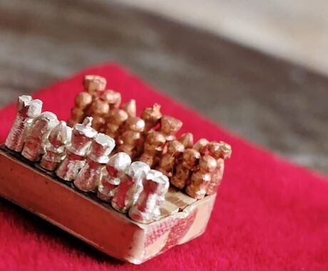 Smallest Handmade Chess Board Along With Chess Pieces Made By An Individual